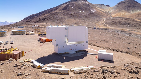 A photo that shows the site of the Simons Observatory sits at an elevation of 17,000 feet in northern Chile. The observatory’s large-aperture telescope is visible in the foreground.