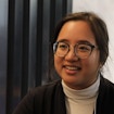 Lisa Tran sitting and talking