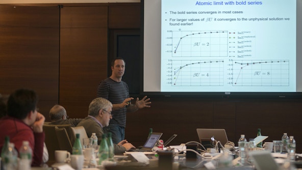 Michael Ferrero presenting a slideshow that says