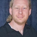 Portrait photo of Daniel Needleman