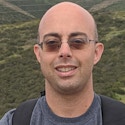 A portrait photo of Shachar Lovett.