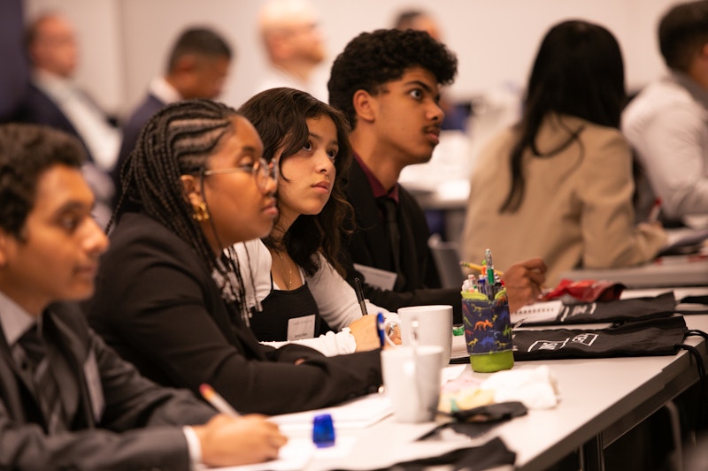 Students taking notes.