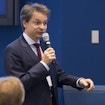 Yuri Tschinkel talking into a microphone